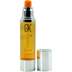 GK HAIR Argan Oil Serum bottle pour shows quick frizz control and shine.