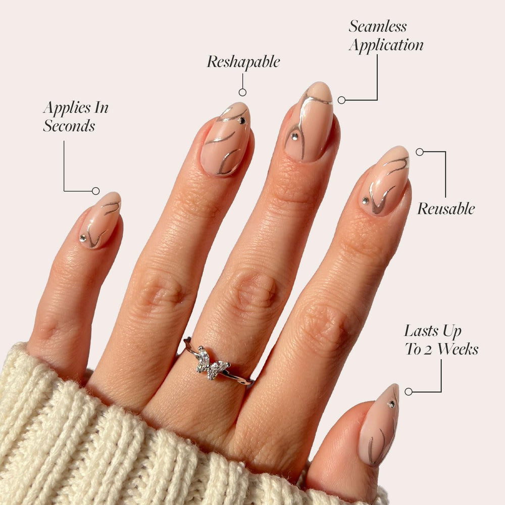 Glamnetic Astro nails glossy finish on short almond tips for quick chic wear.