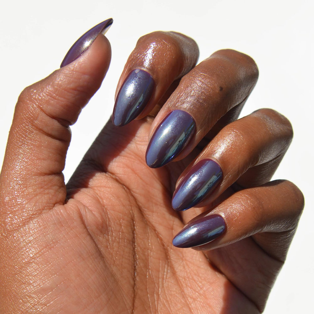 Glamnetic Burgundy Chrome nails set shows almond tips with high-gloss finish for durable salon shine.
