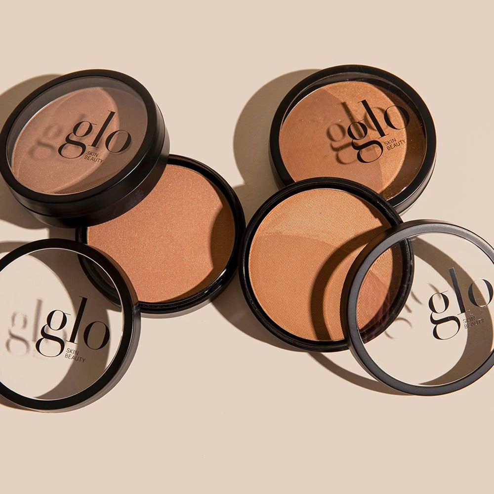 Glo Skin Beauty Bronzer Sunkiss on cheek for sun-kissed glow.