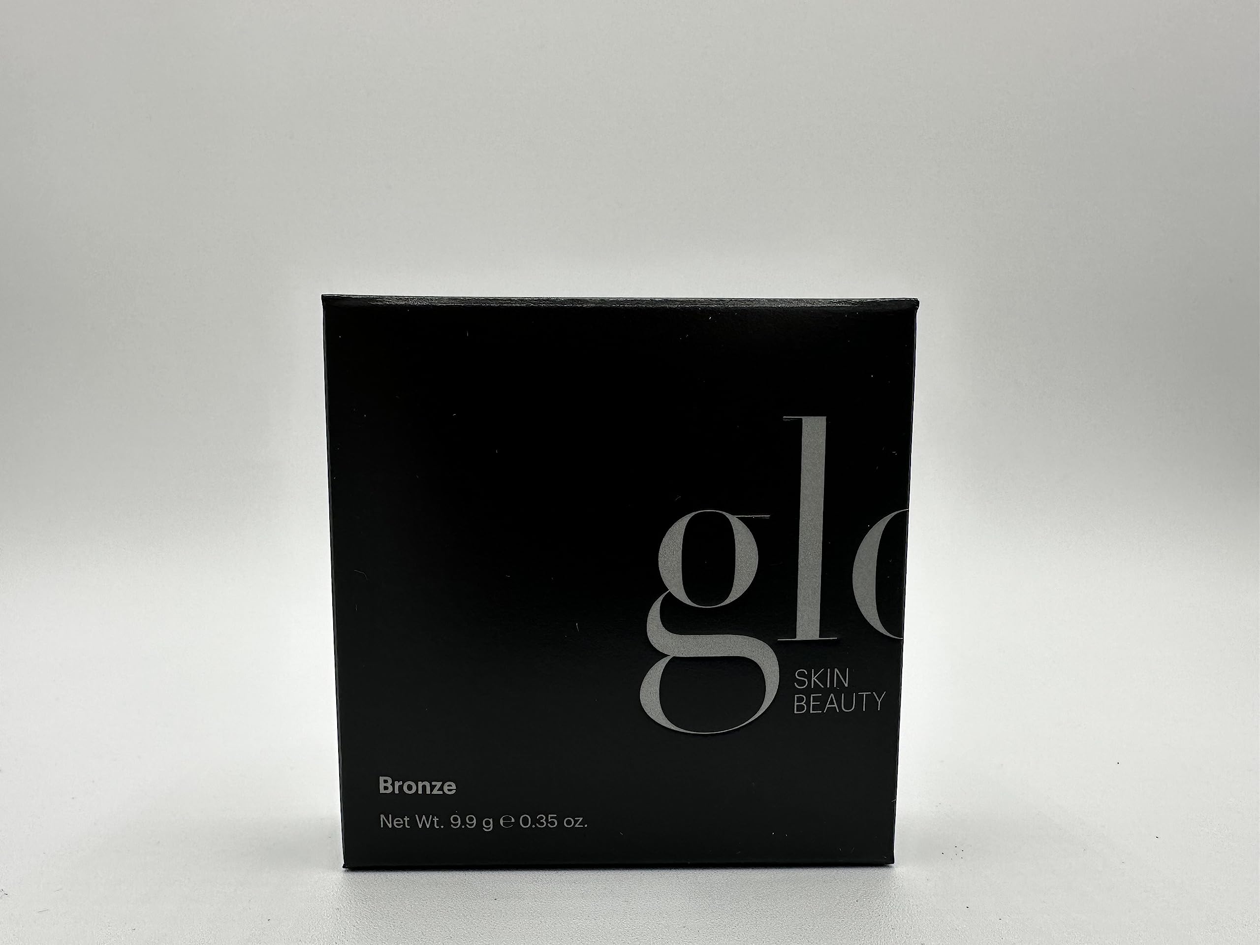 Glo Skin Beauty Bronzer Sunkiss close-up shows silky mineral texture.