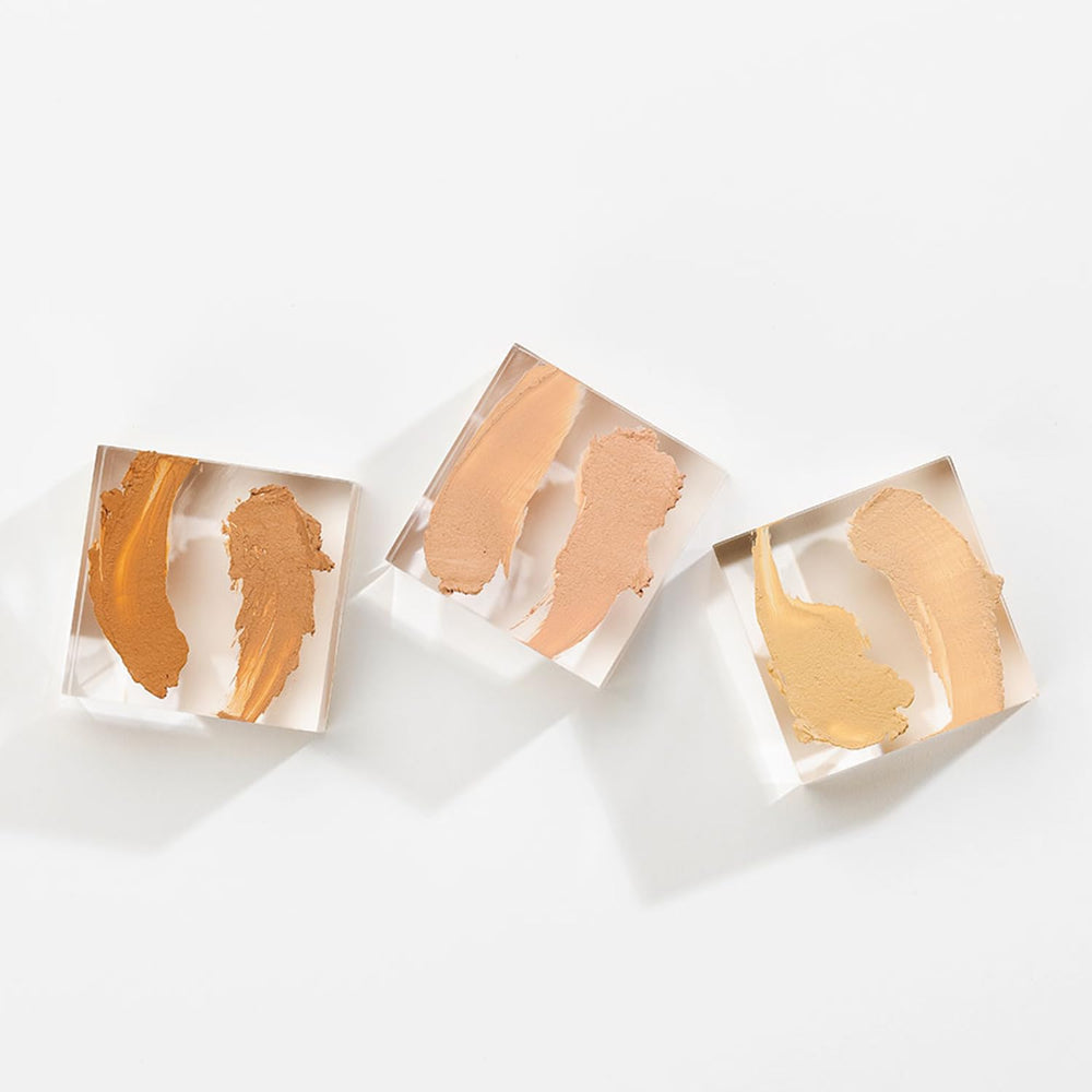 Glo Skin Beauty Concealer Sand texture close-up with non-oily finish.