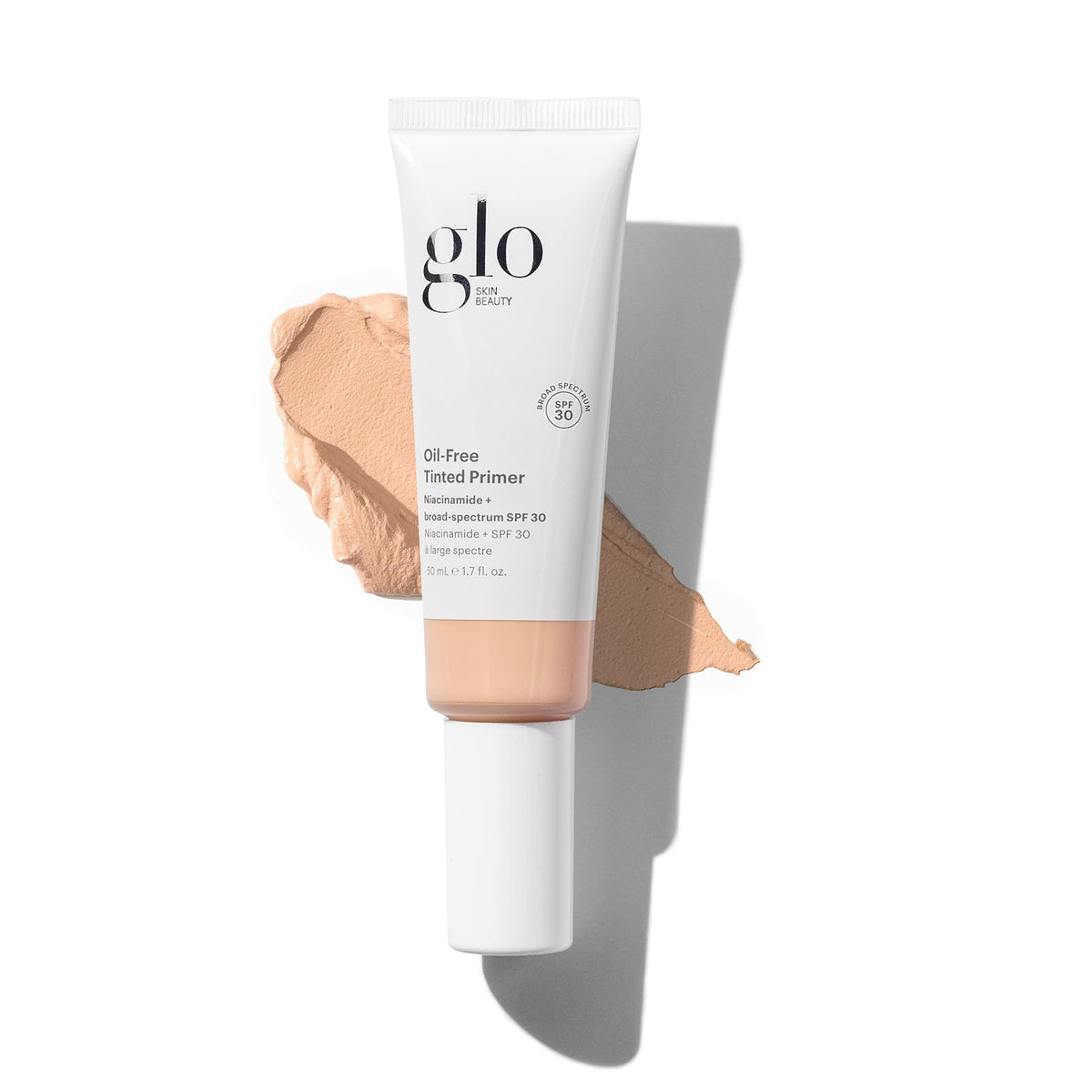 Glo Skin Beauty oil-free tinted primer bottle with SPF 30 for light protection.