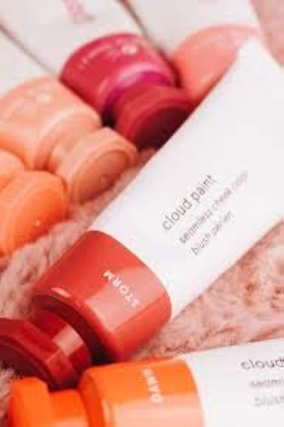 Glossier Cloud Paint Storm on cheek provides a soft, buildable glow.