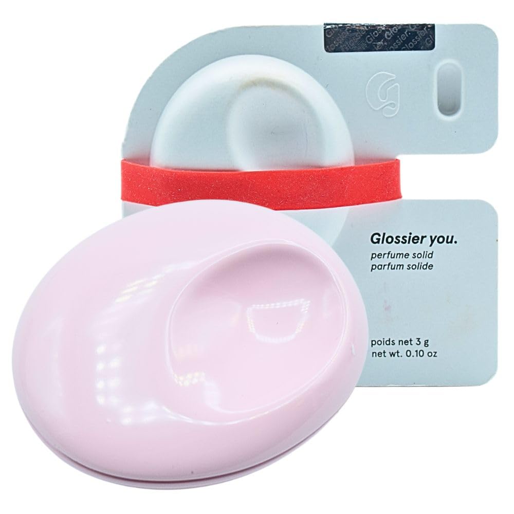 Glossier You Solid compact close-up in pink enamel for portable elegance