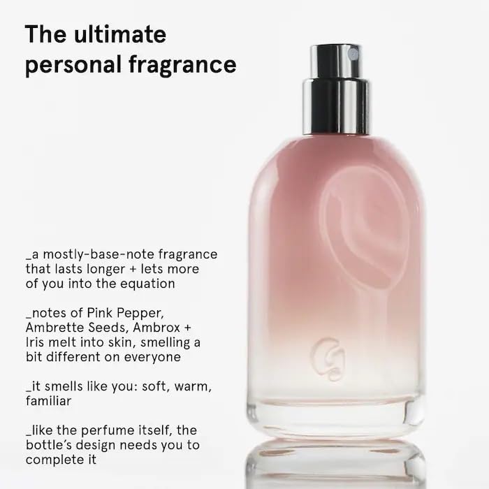 Glossier You thumbprint bottle detail highlights personalized design and distinctive branding.