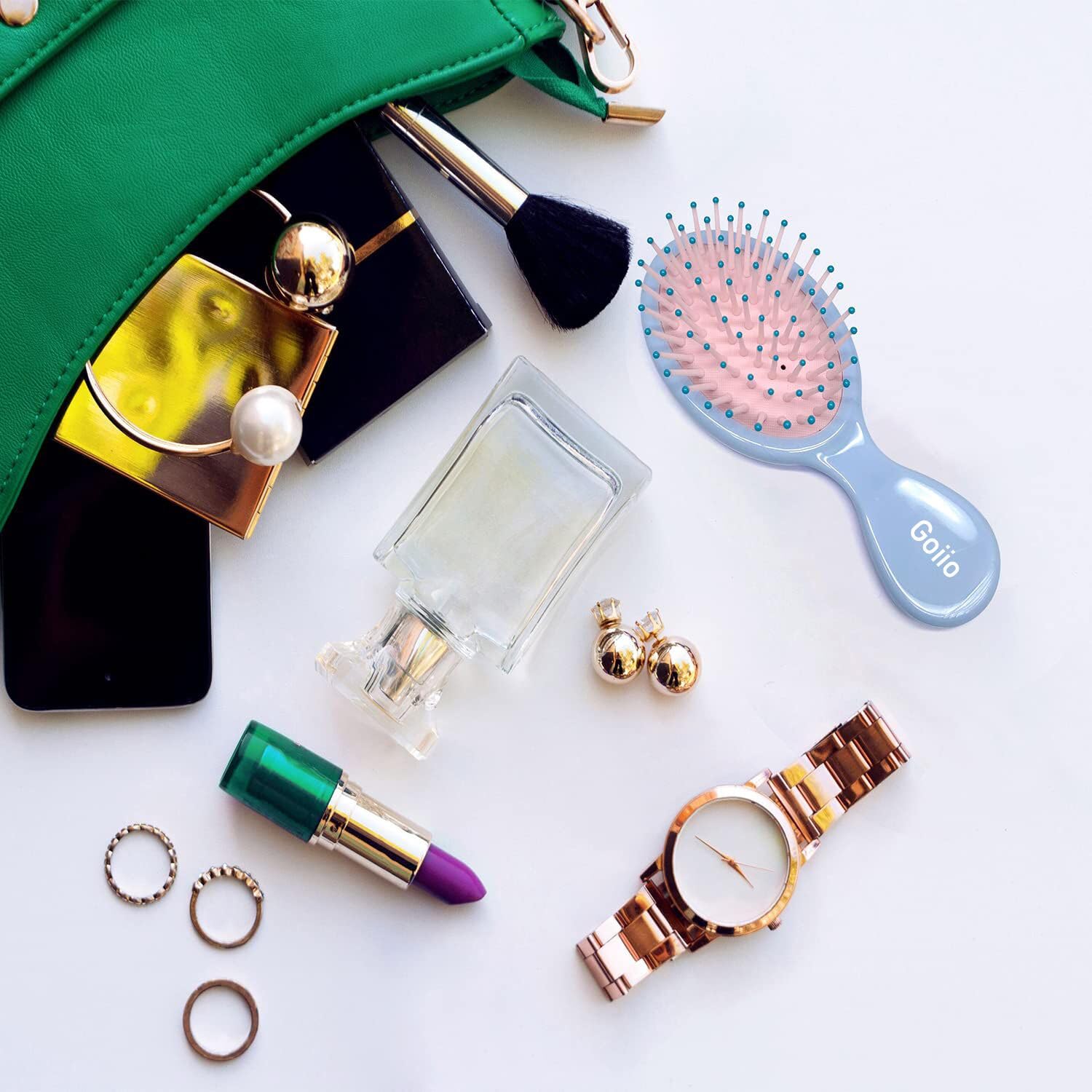 Goiio mini brush lifts roots to speed up drying and airflow between strands.