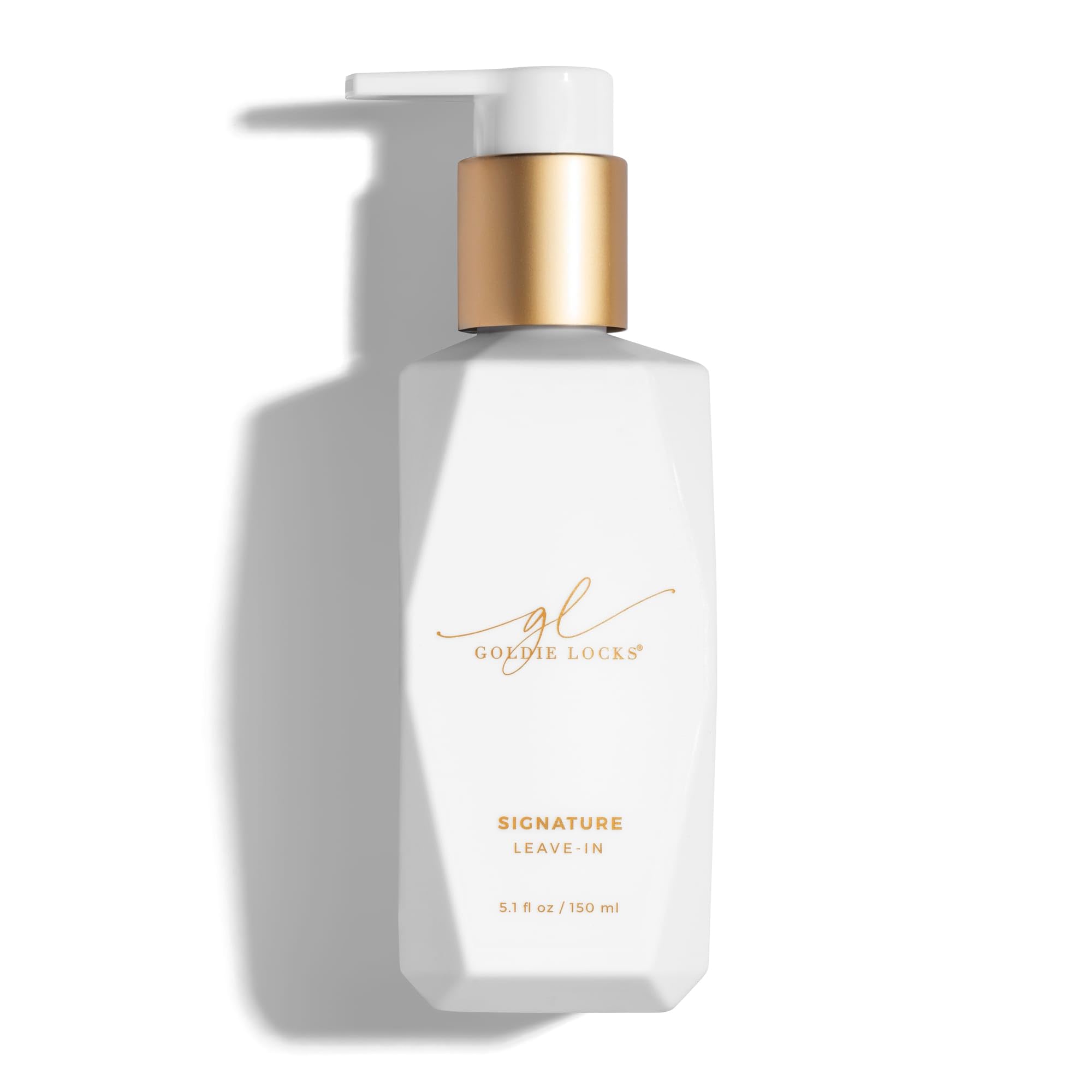 Goldie Locks Signature Leave-In Conditioner bottle closeup offering quick detangling and frizz control.