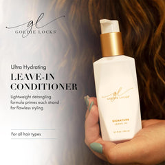 Goldie Locks Signature Leave-In Conditioner mist applied to flyaways for frizz control.