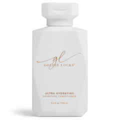 Goldie Locks travel-size bottle image promotes on-the-go frizz control.
