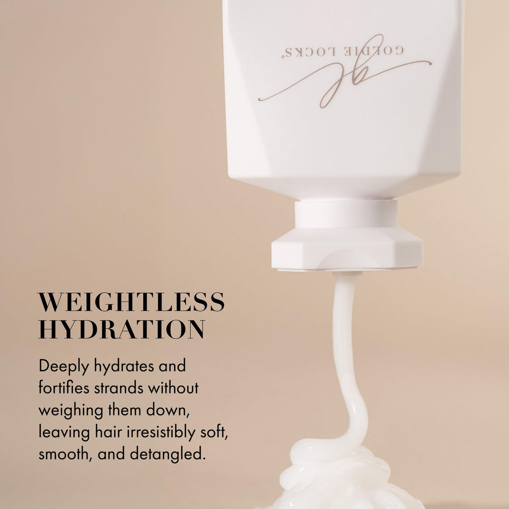 Goldie Locks travel-size conditioner travel-case image shows TSA-friendly packaging for on-the-go moisture.