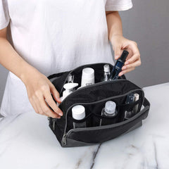 Gonex travel toiletry bag nylon black zipper closure ensures secure packing.