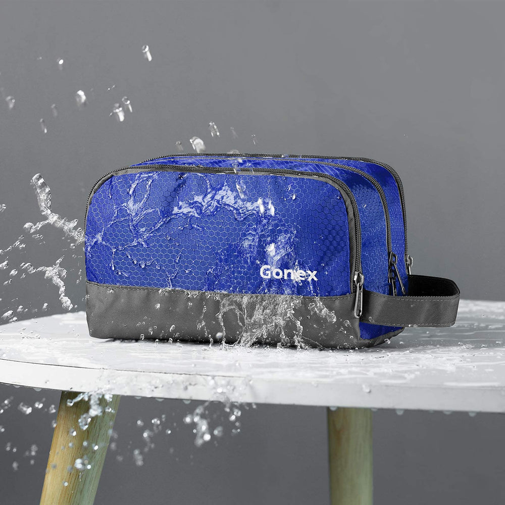 Gonex travel toiletry bag main compartment stores larger items like shampoo