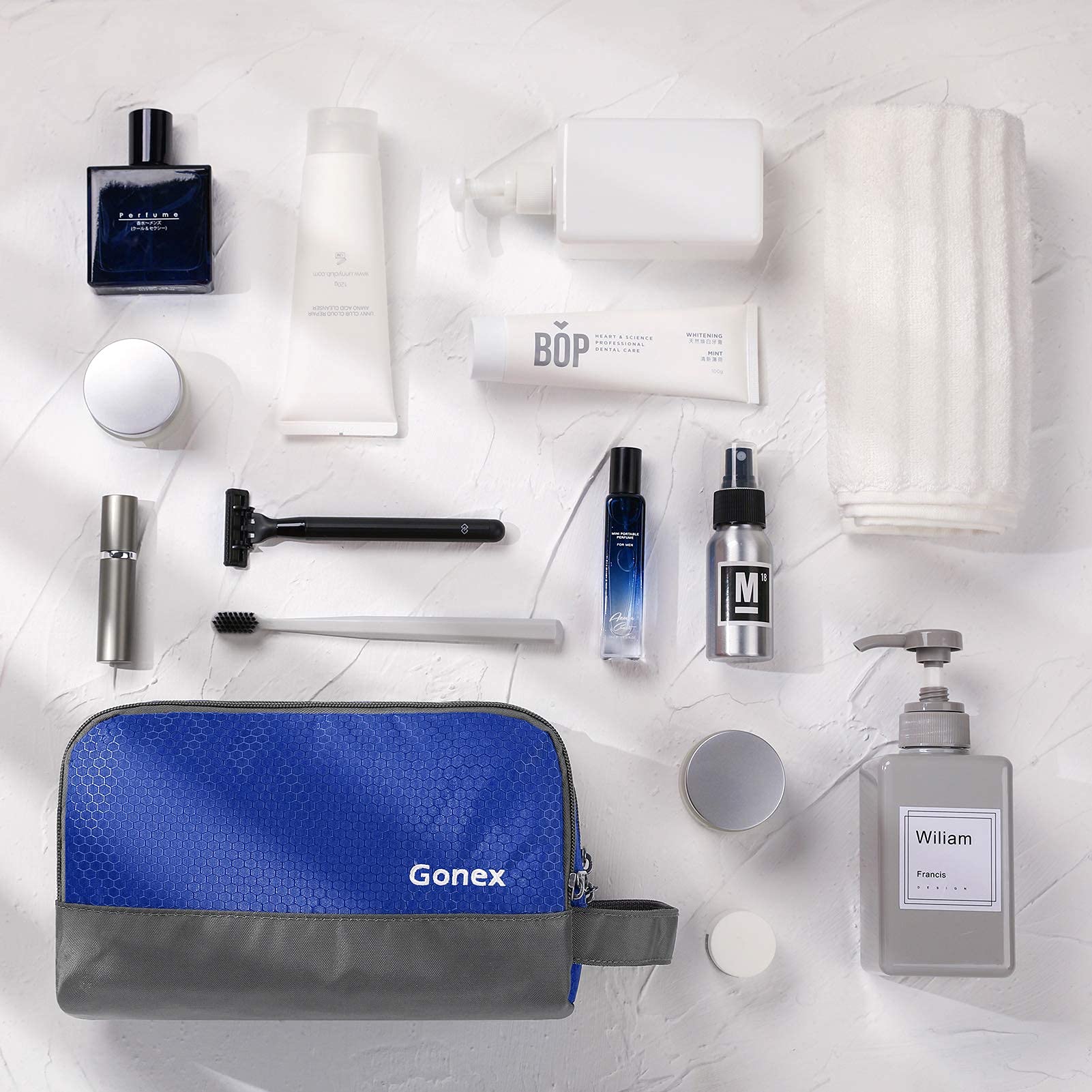 Gonex travel toiletry bag packed compactly fits in a duffel