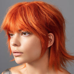 Good Dye Young Copper Orange dye being applied to hair for rich temporary color.