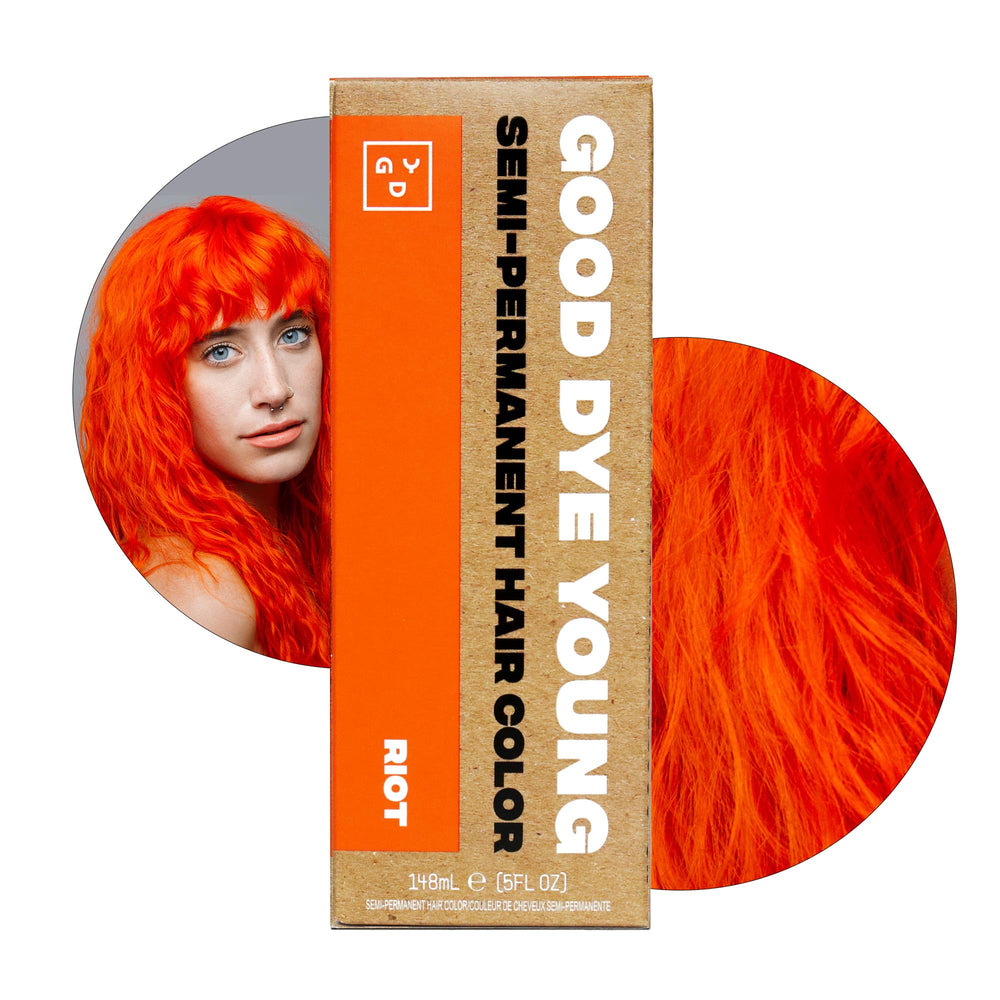 Good Dye Young Riot hair dye tube delivering neon orange color for bold looks.