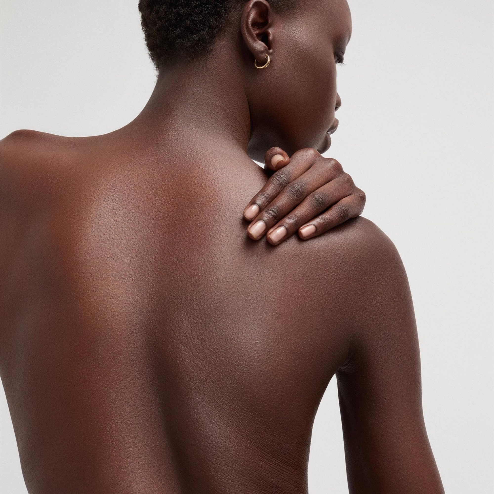 goop Beauty Body Butter application on hands demonstrates smoothing, immediate comfort and improved skin feel