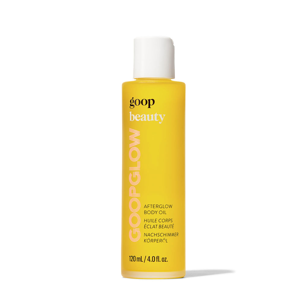 goop Beauty Body Oil bottle pour showing luxurious texture and instant hydration.