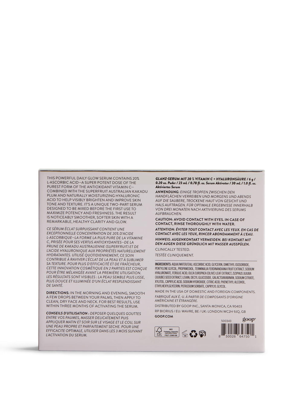 goop bottle close-up with droplet—hydration detail and luxe texture.