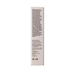 Goop Beauty Exfoliating Jelly Cleanser closeup bottle shows gentle gel wash.