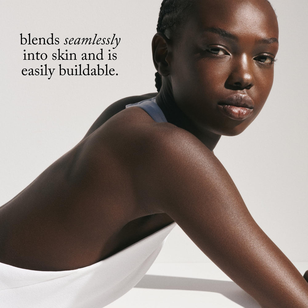 Goop Beauty Glow Skin Highlighter Stick champagne gold aura adds warm radiance.