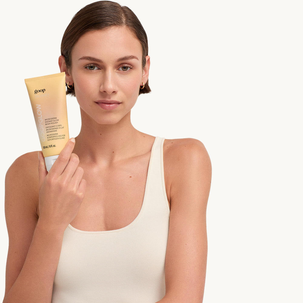 goop Beauty Microderm Body Polish shower-routine image shows in-shower pampering.