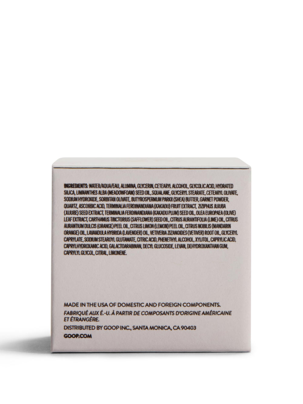 goop Beauty Microderm Exfoliator ready-to-use tube against minimalist backdrop