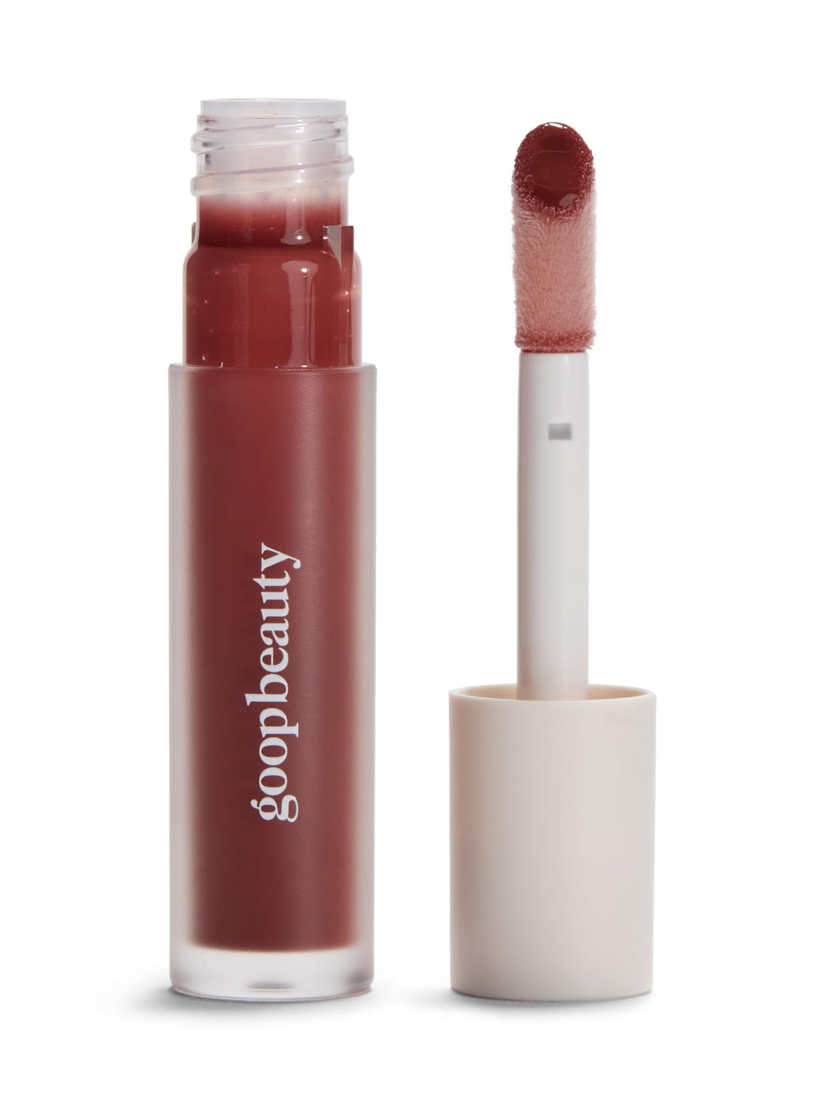goop Hydra-Barrier Gel Gloss Spice tube closeup shows creamy texture and hydration on lips