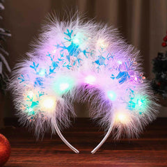 GORTIN snowflakes feathers headband adds shimmering detail for holiday looks.