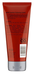 Applying Got2B Boosted thickening cream to hair to lift roots and add texture