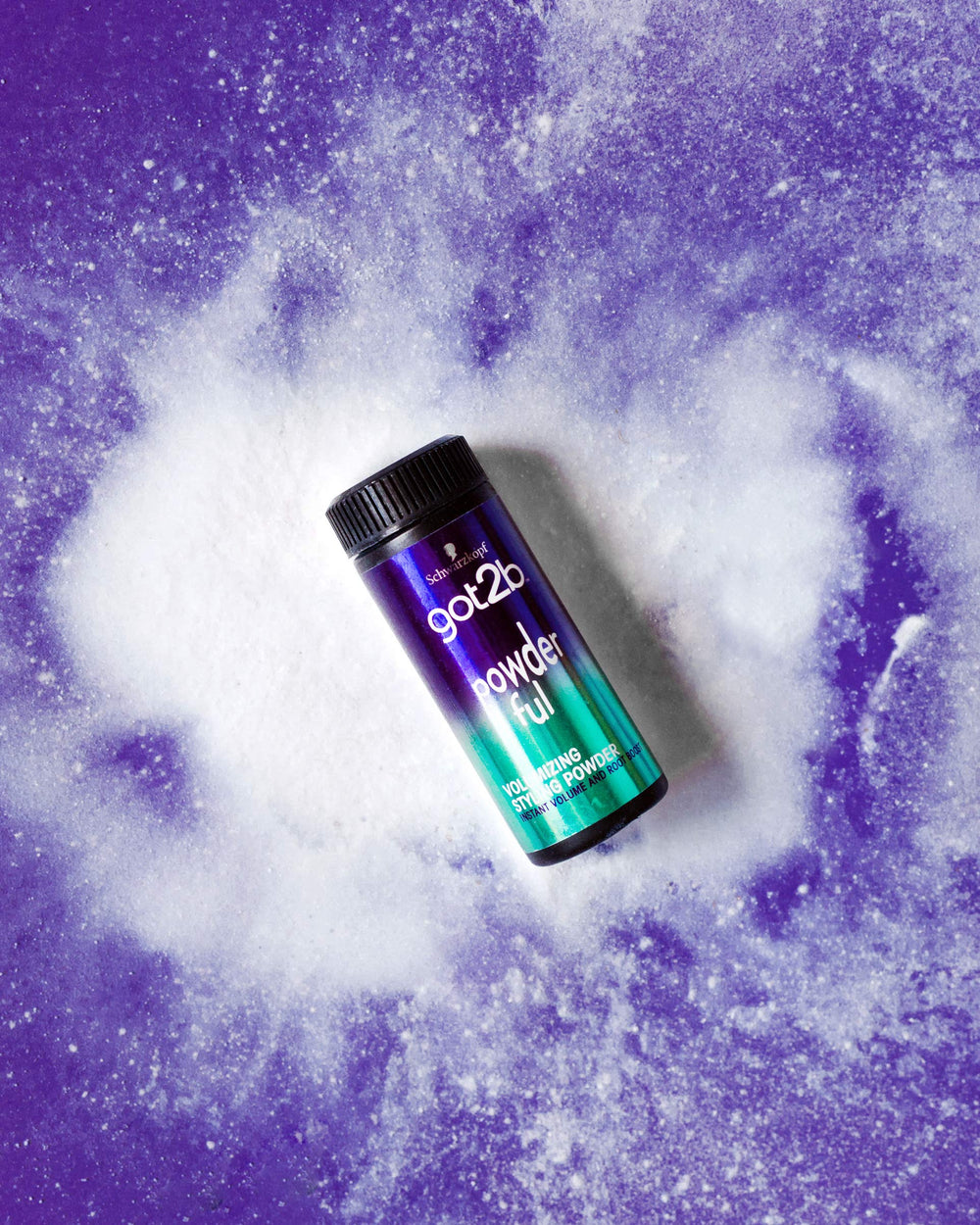 Got2B powder next to hand to show compact 10g travel-friendly size