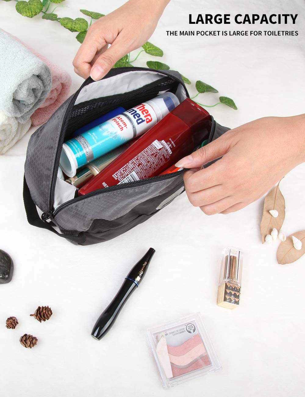 GOX toiletry bag hanging hook demonstrates easy bathroom access while traveling.