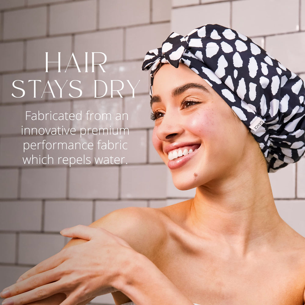 GRACE & COMPANY shower cap worn on head showing roomy cap for thicker hair.