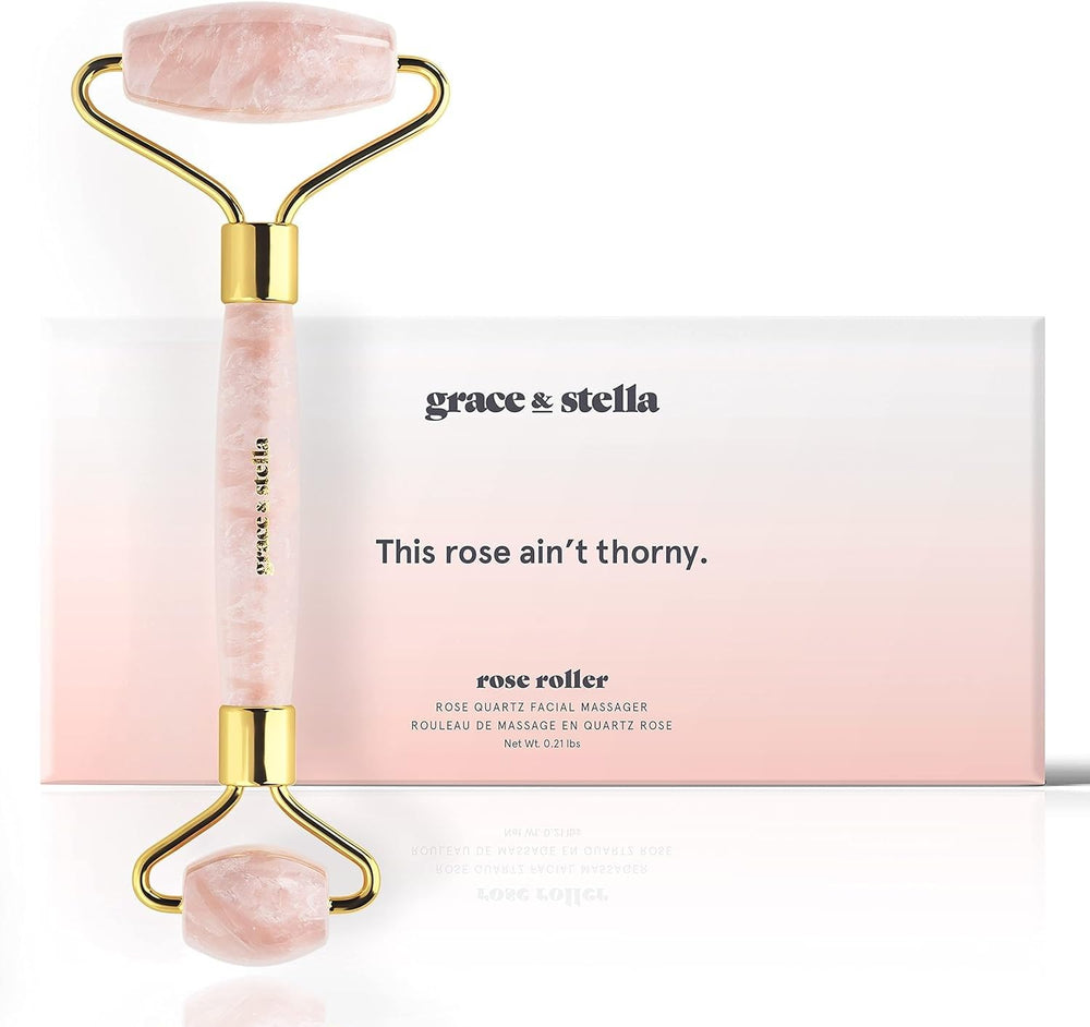 Grace & Stella Rose Quartz Roller on cheek for soothing glow and circulation.