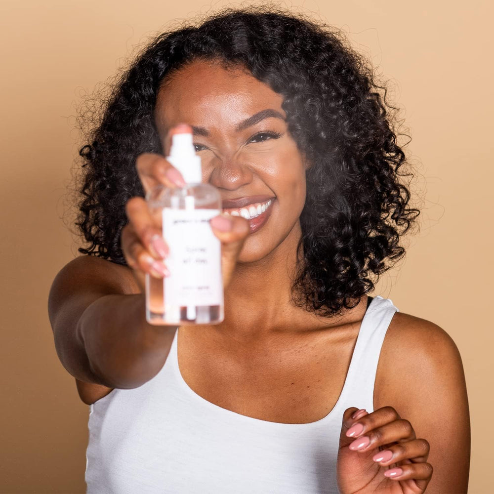 Grace & Stella Rose Water Spray in-use for a midday refresh
