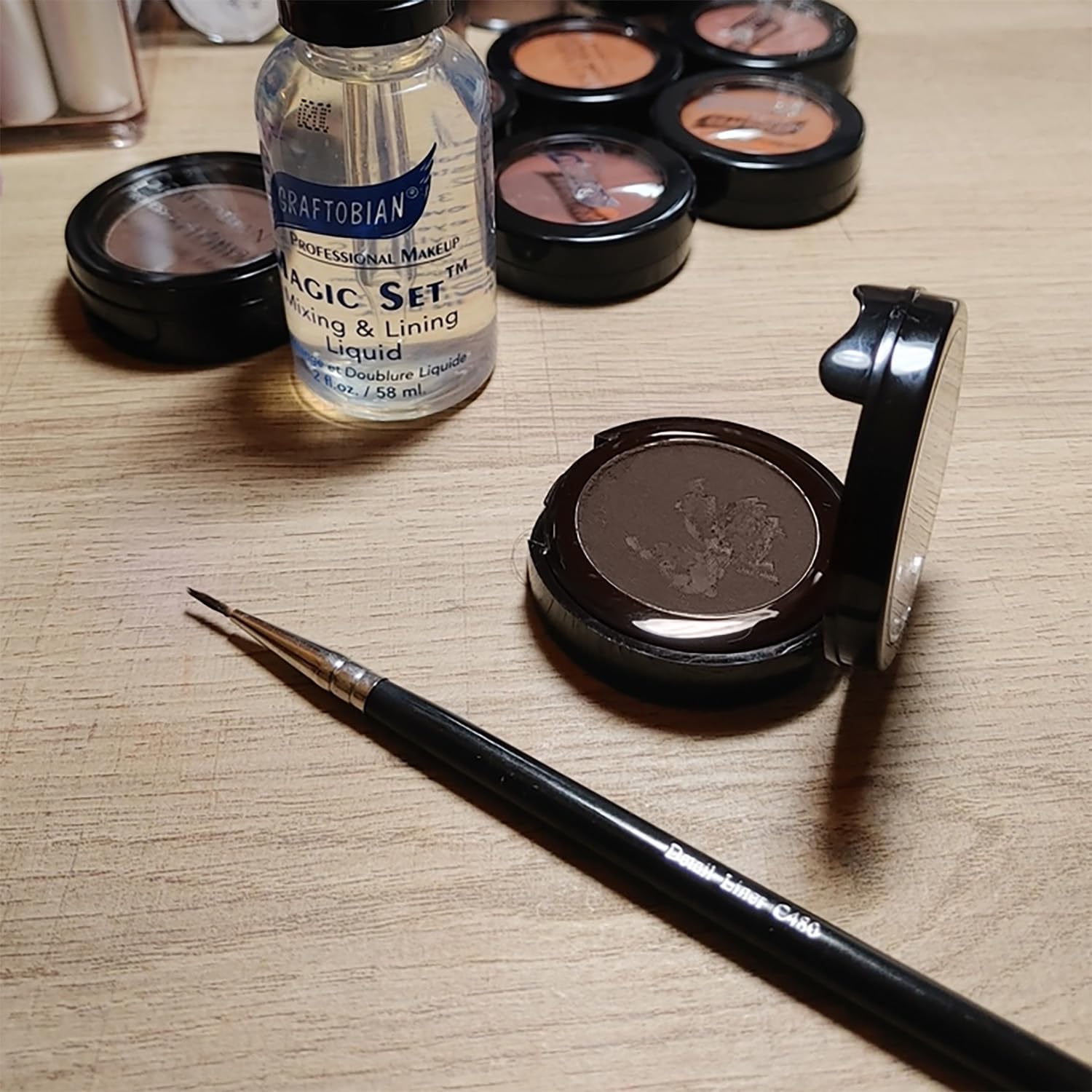 Graftobian Espresso Brown Cake Eyeliner dry application for subtle, natural definition.