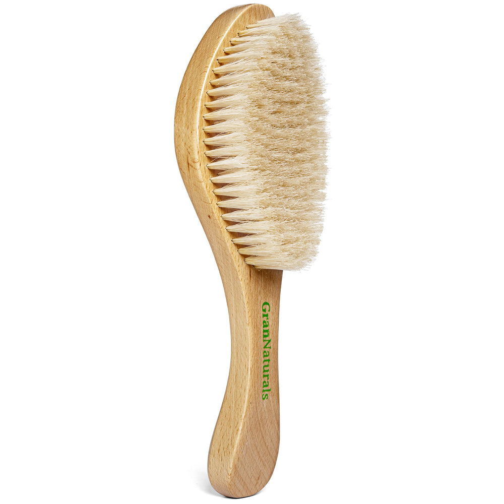 GranNaturals soft-bristle 360 wave brush close-up for smoothing and finishing hair.