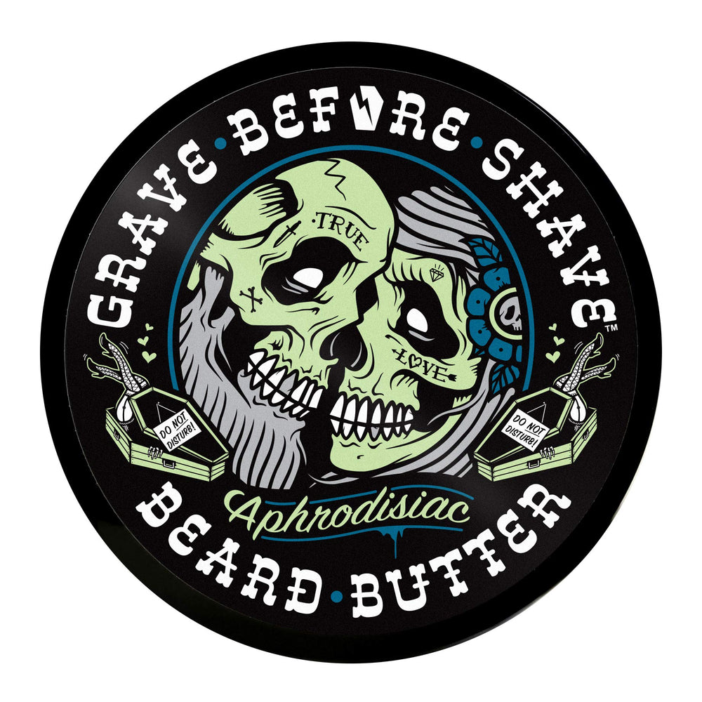 Grave Before Shave beard butter in hand applying to soften beard and soothe skin.