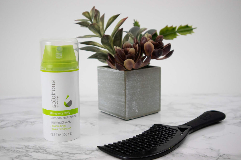 GREAT CLIPS Designing Taffy application on damp hair enables easy styling and even distribution.