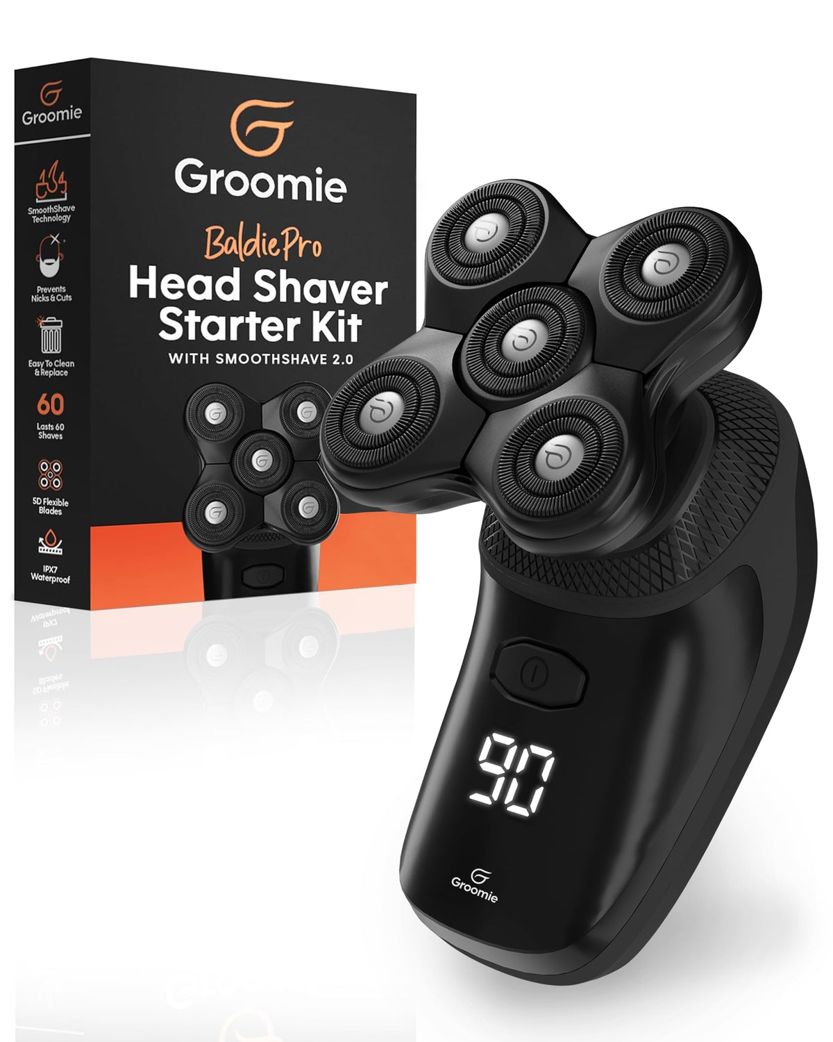 Groomie BaldiePro head shaver in hand for a quick, comfortable bald shave