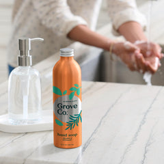 Grove Co reusable hand soap dispenser shown ready for refill.