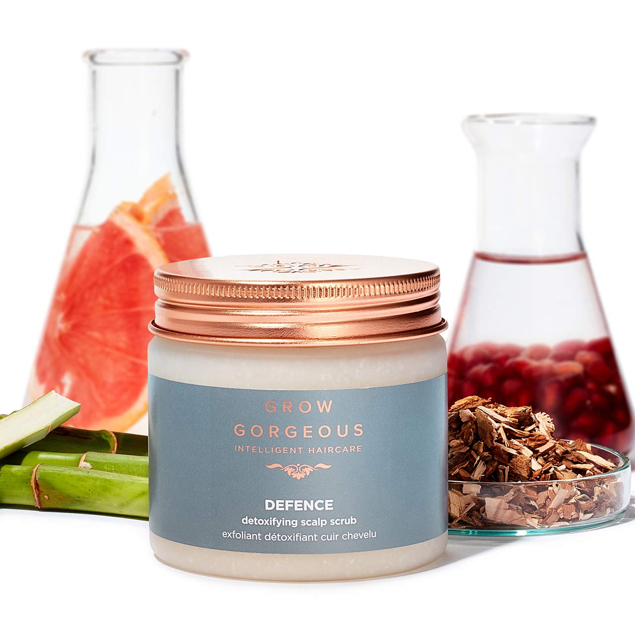 Grow Gorgeous scrub being massaged into scalp showing cleansing action
