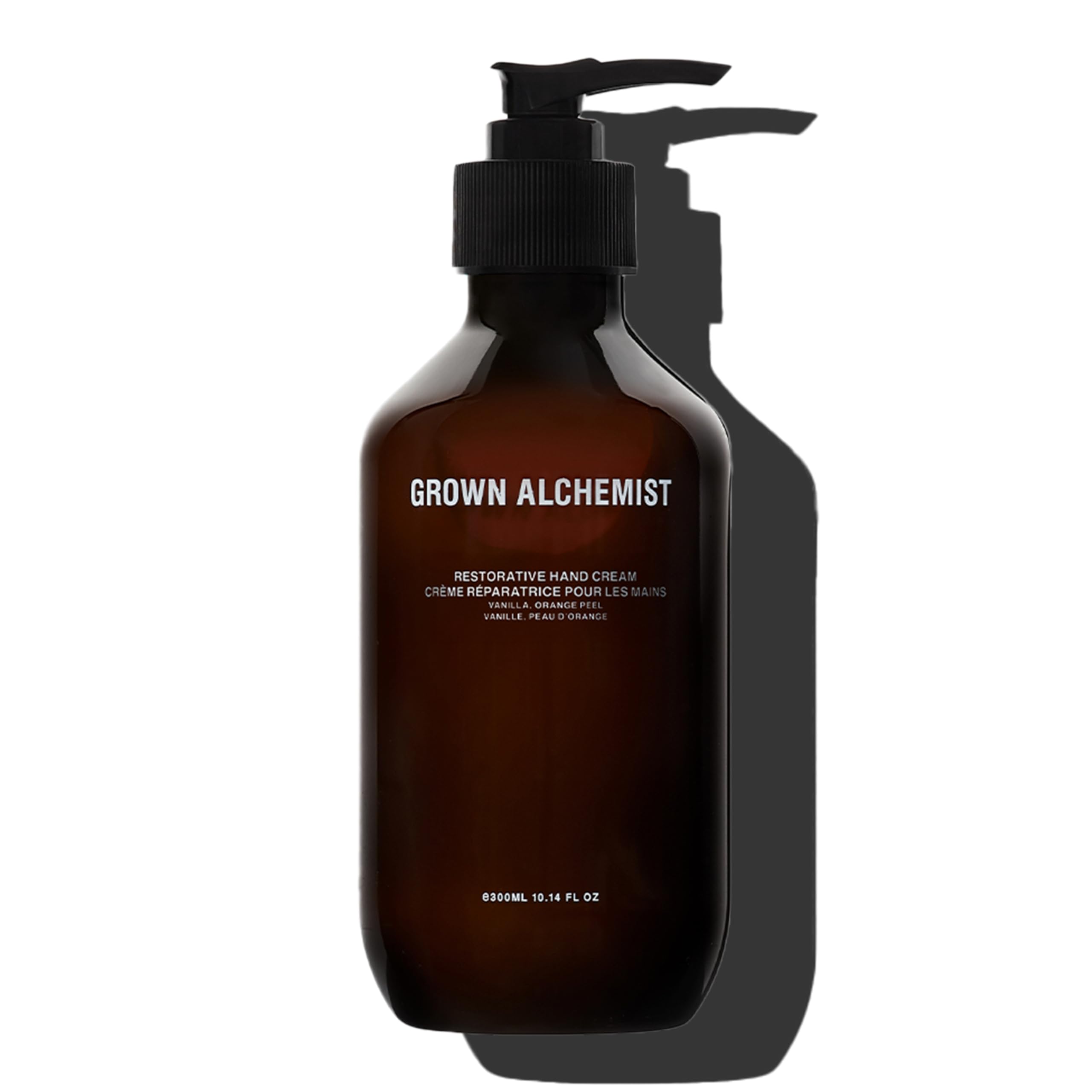 Grown Alchemist Restorative Hand Cream bottle close-up shows vanilla-orange peel scent and nourishing oils.