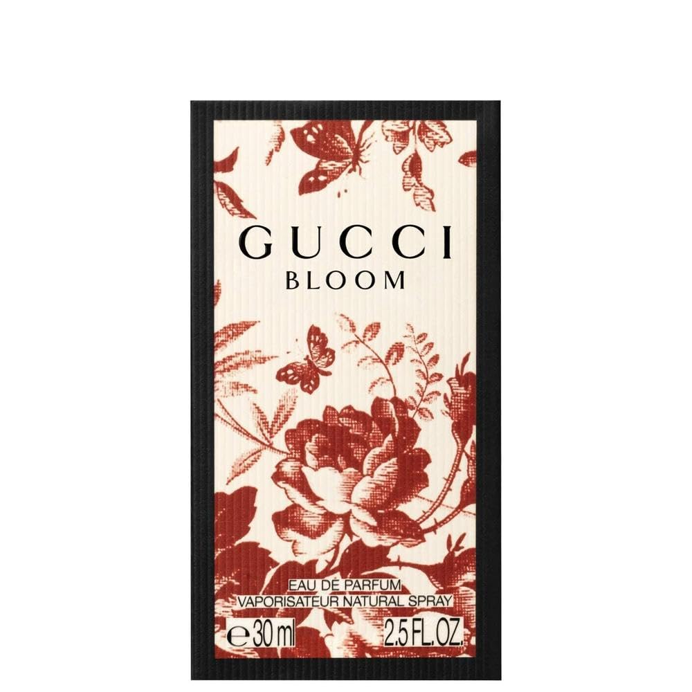 Gucci Bloom EDP liquid visible, hinting at fresh floral aura.