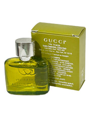 Gucci Guilty Elixir mini travel case pairs with trips and daily use.