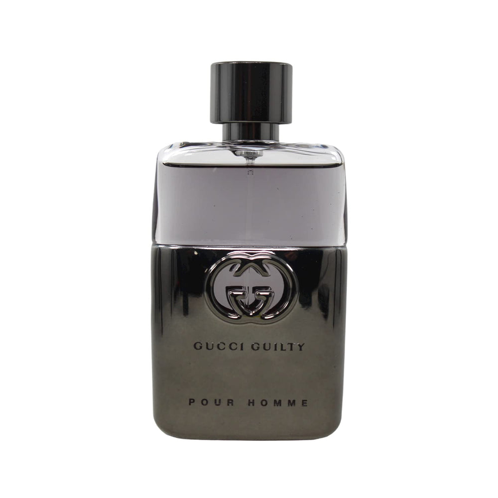 Gucci Guilty for Men display on shelf with 1.6 oz bottle indicates portable daily wear.