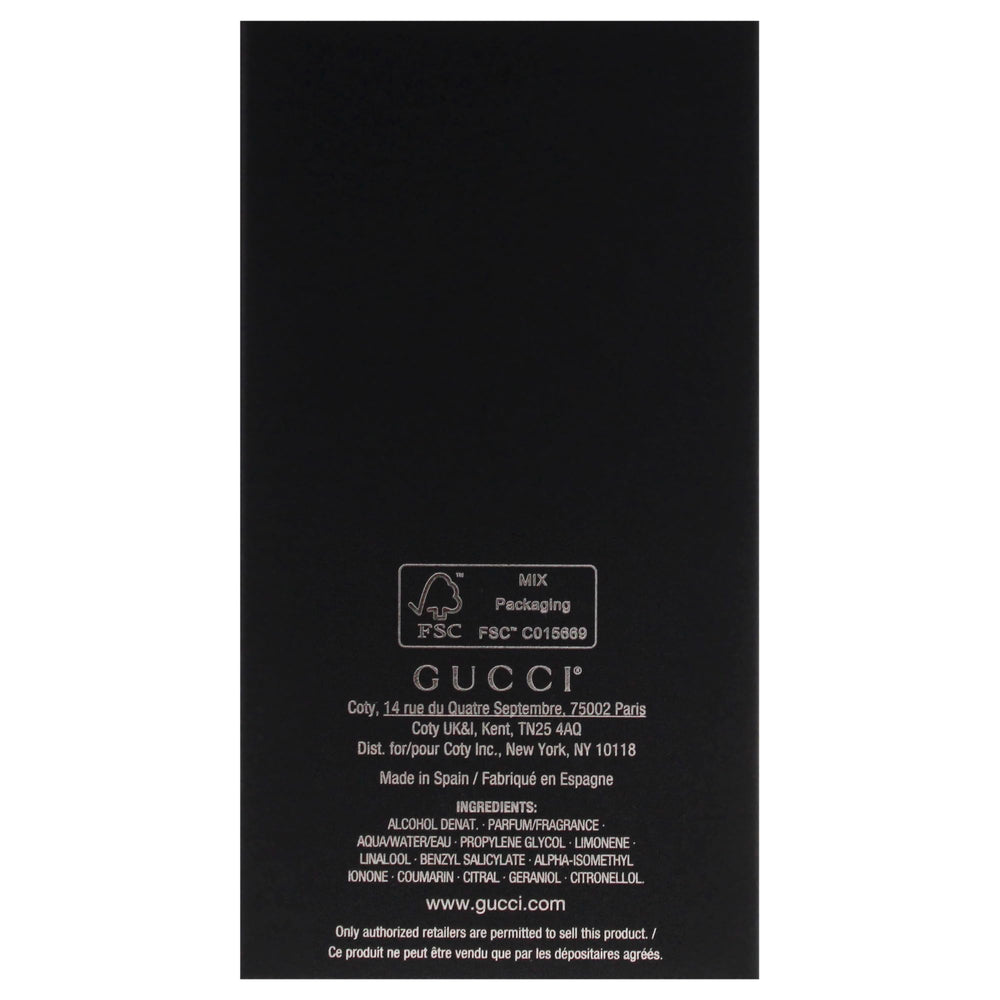 Gucci Guilty Men close-up spray action suggests easy, on-the-go scenting.