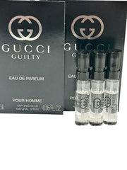 Gucci Guilty travel-friendly set—compact parfums for on-the-go scent.