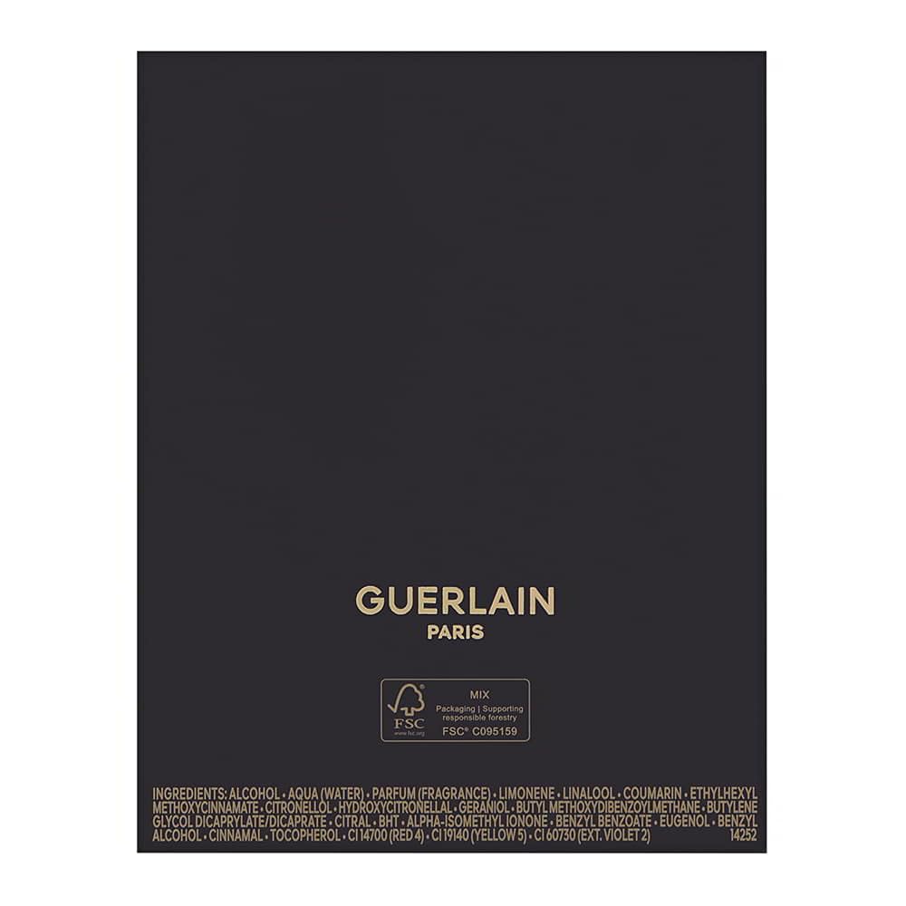 Guerlain Shalimar bottle closeup—luxury fragrance notes captivate in any setting.