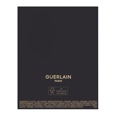 Guerlain Shalimar bottle closeup—luxury fragrance notes captivate in any setting.